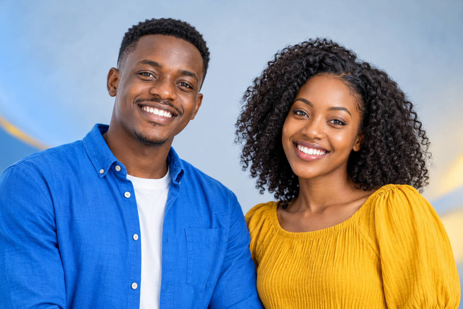 Two smiling young learners wearing JuaFit blue and gold